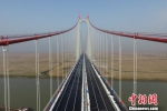 中国第一大跨径钢桁梁悬索桥通车 环洞庭湖高速圈形成 - 湖南新闻网