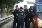 图为邵东警方赴老挝押解嫌疑人回国 - 新浪湖南